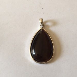 S H cat eye pendent
